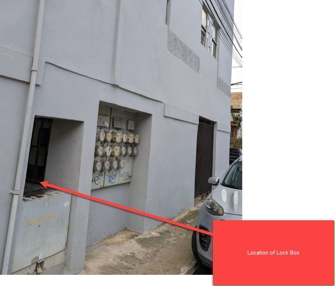The lockbox is located on the side of the building.